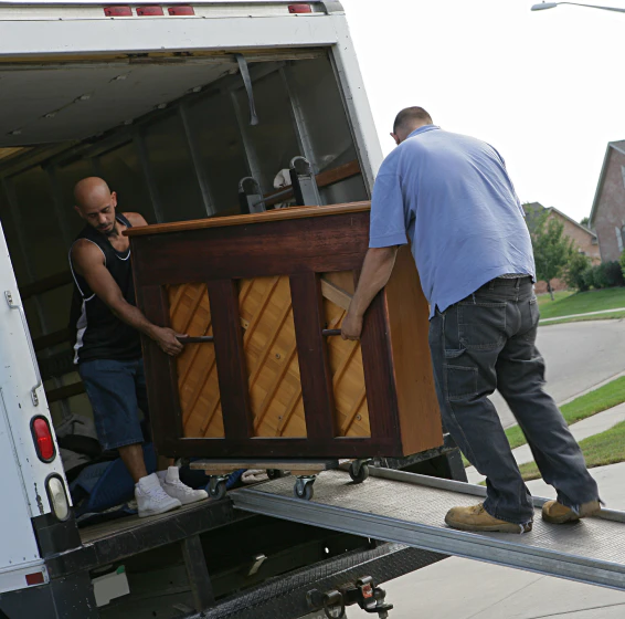 workers moving piano